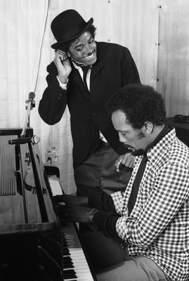 Michael Jackson and Quincy Jones composing songs in a Los Angeles recording studio