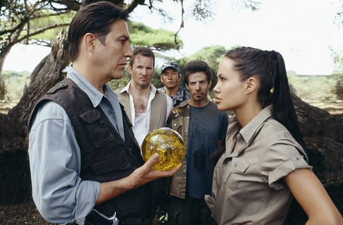 (Front left to right) Ciarán Hinds as Jonathan Reiss and Angelina Jolie as Lara Croft (back left) Christopher Barrie as Hillary and (back right) Noah Taylor as Bryce.