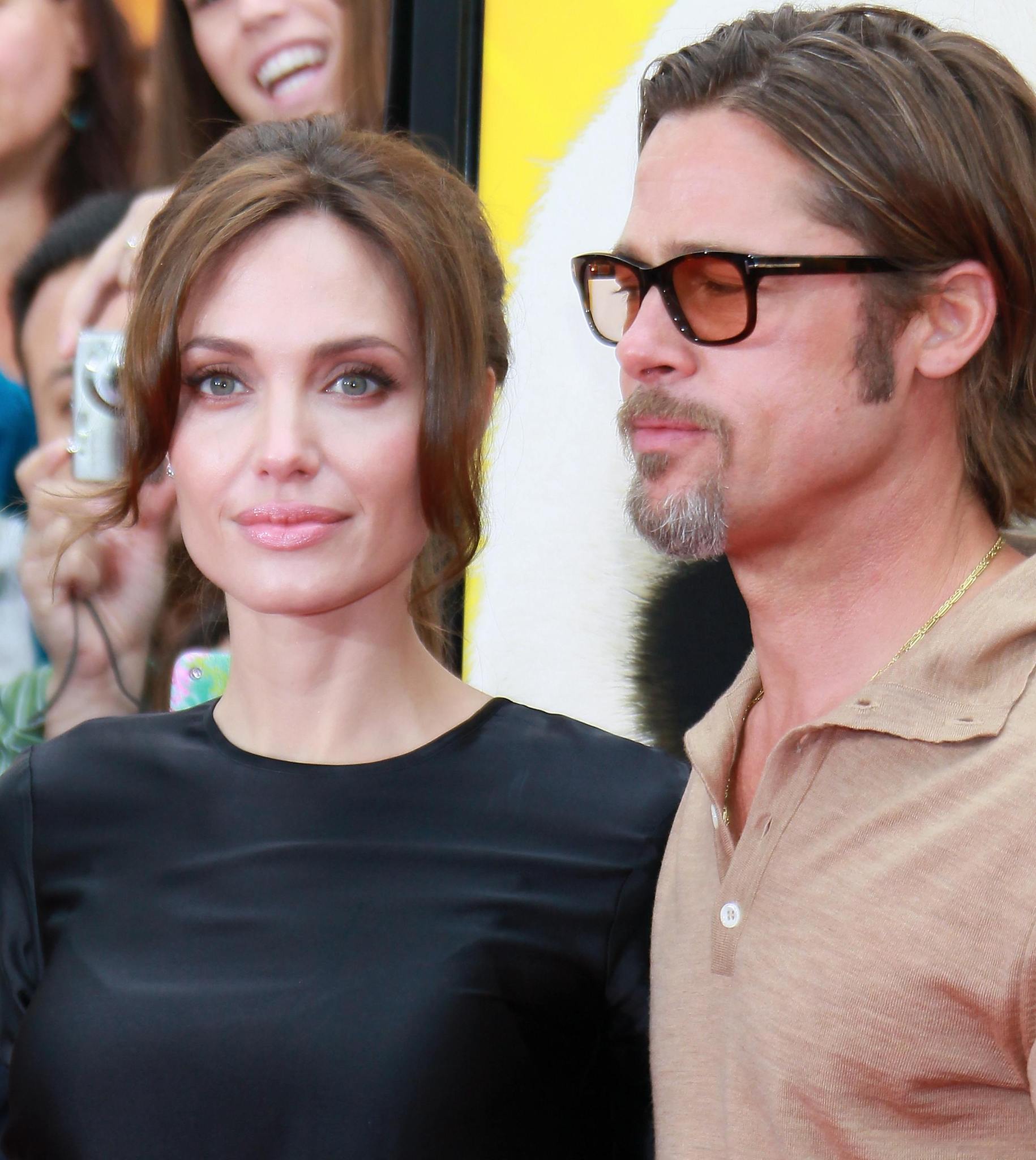 Brad Pitt and Angelina Jolie at event of Kung Fu Panda 2 (2011)