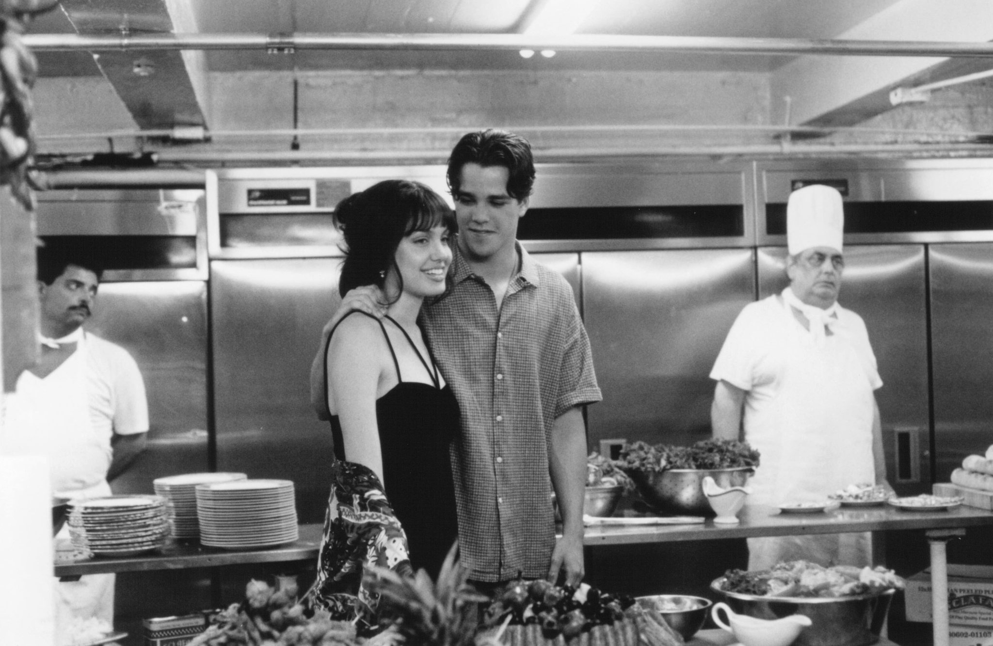 Still of Angelina Jolie and Nathaniel Marston in Love Is All There Is (1996)