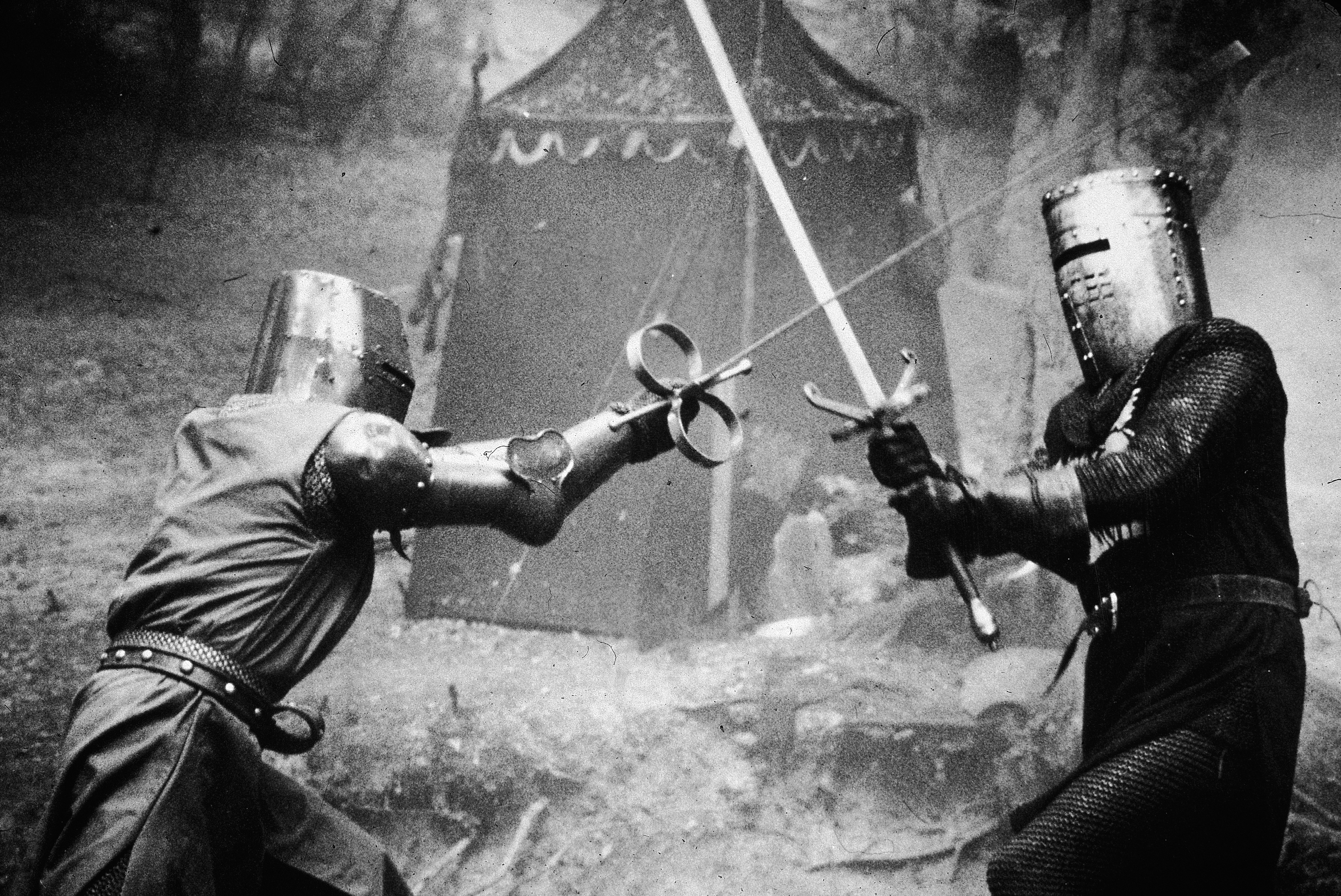 Still of Terry Gilliam, Terry Jones and Michael Palin in Monty Python and the Holy Grail (1975)