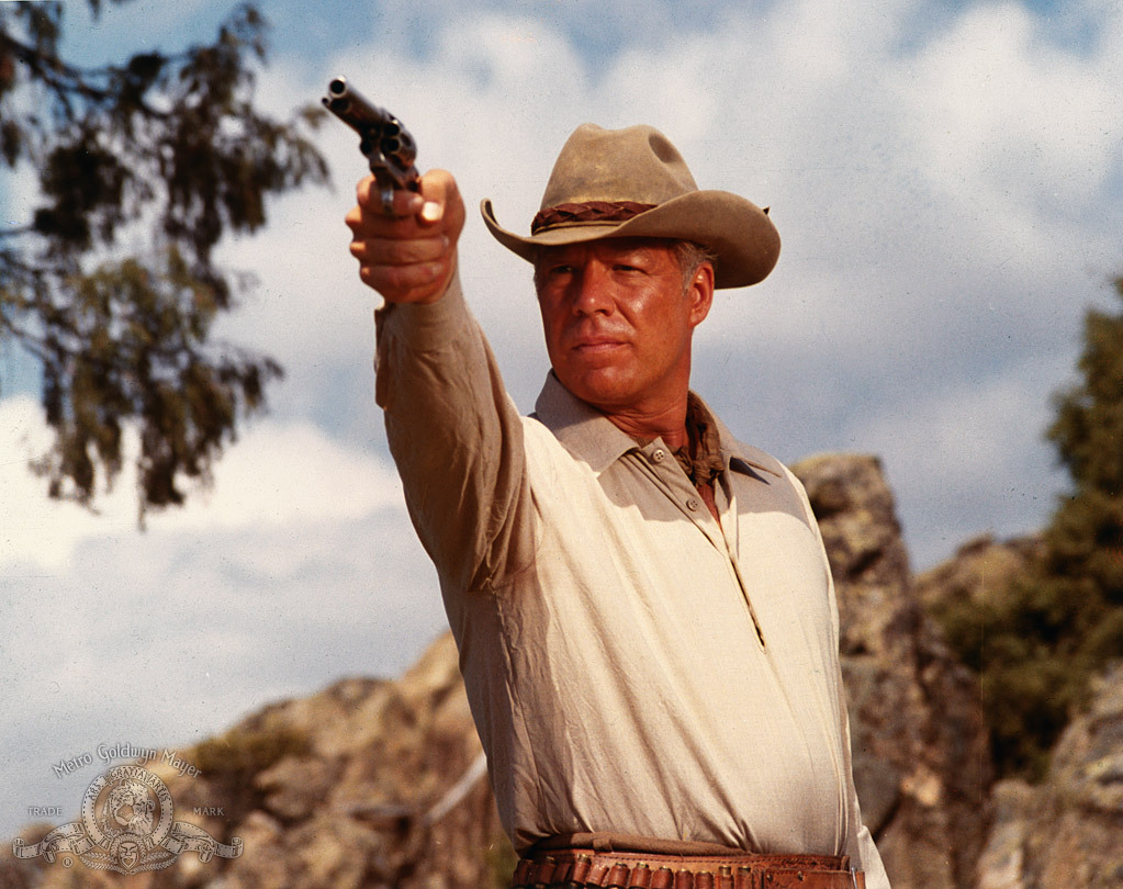 Still of George Kennedy in Guns of the Magnificent Seven (1969)