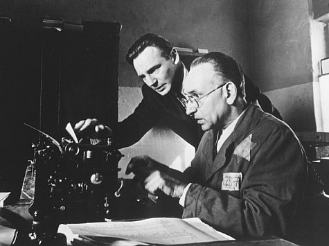 German industrialist Oskar Schindler (Liam Neeson) and Jewish accountant Itzhak Stern (Ben Kingsley) assemble the list of more than 1,100 Jewish workers to be placed under Schindler's protection.
