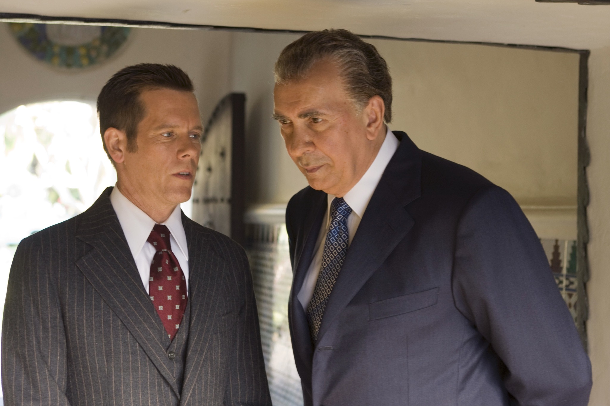 Still of Kevin Bacon and Frank Langella in Frost/Nixon (2008)