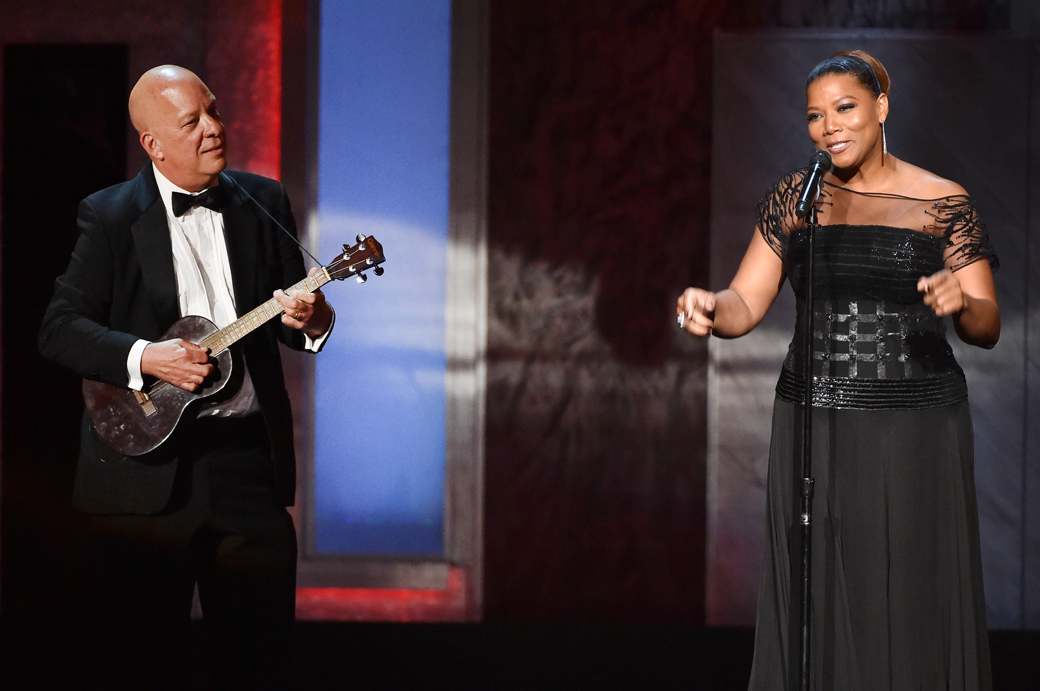 Queen Latifah and Tim May