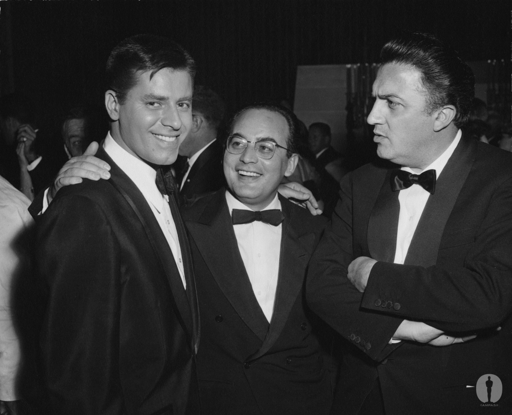 Jerry Lewis with Best Foreign Language Film producer Dino De Laurentiis and director Federico Fellini (