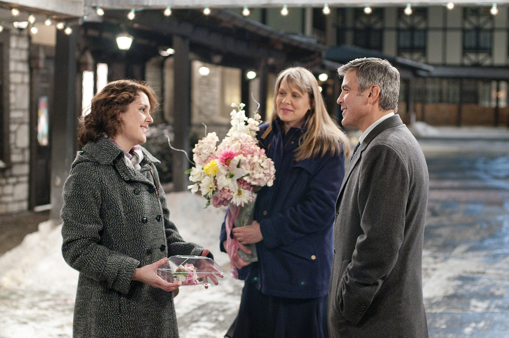 Still of George Clooney, Melanie Lynskey and Amy Morton in Viskas ore! (2009)