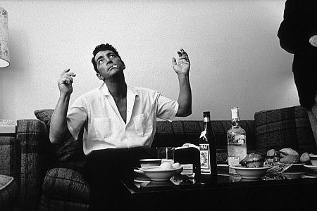 Dean Martin holding up his hands in his dressing room in Hollywood, 1961. Modern silver gelatin, 11x14, signed. © 1978 Sid Avery MPTV