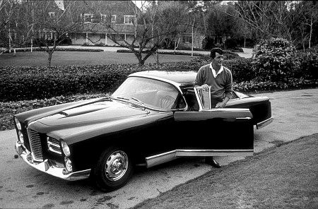 Dean Martin and his Facel Vega HK500, on the driveway of Beverly Hills on Mountian Drive, 1961.
