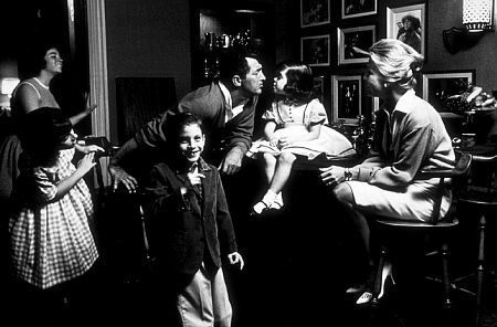 Dean Martin with his wife, Jeanne Beiggers, daughter, Gina, and son, Dino, at home in Brentwood, CA, 1961.