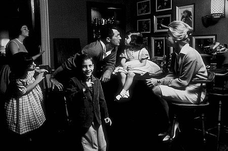 Dean Martin, wife Jeanne, daughter Gina, son Ricci, and rest of the family in their Brentwood home, 1961.