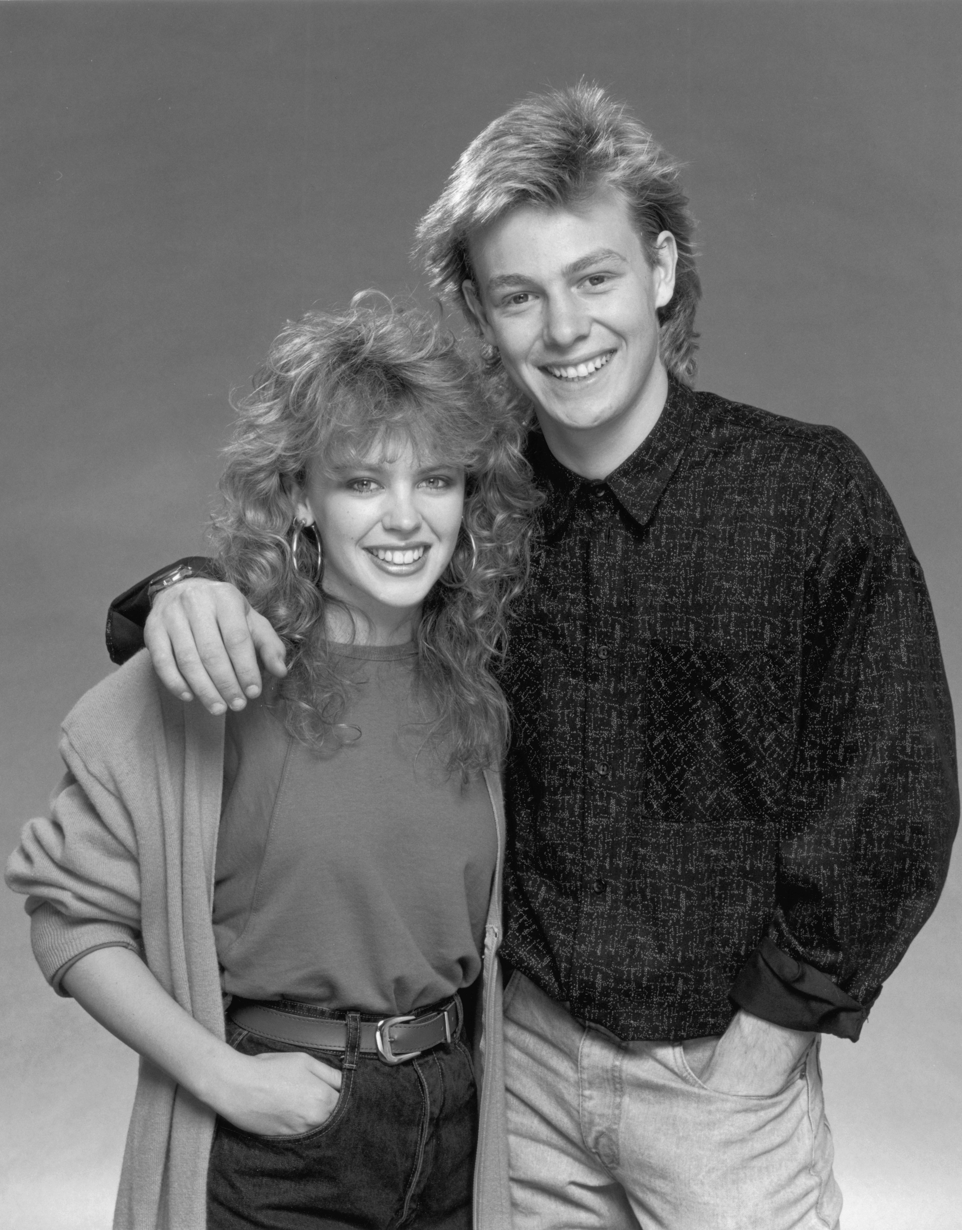 Still of Kylie Minogue and Jason Donovan in Neighbours (1985)