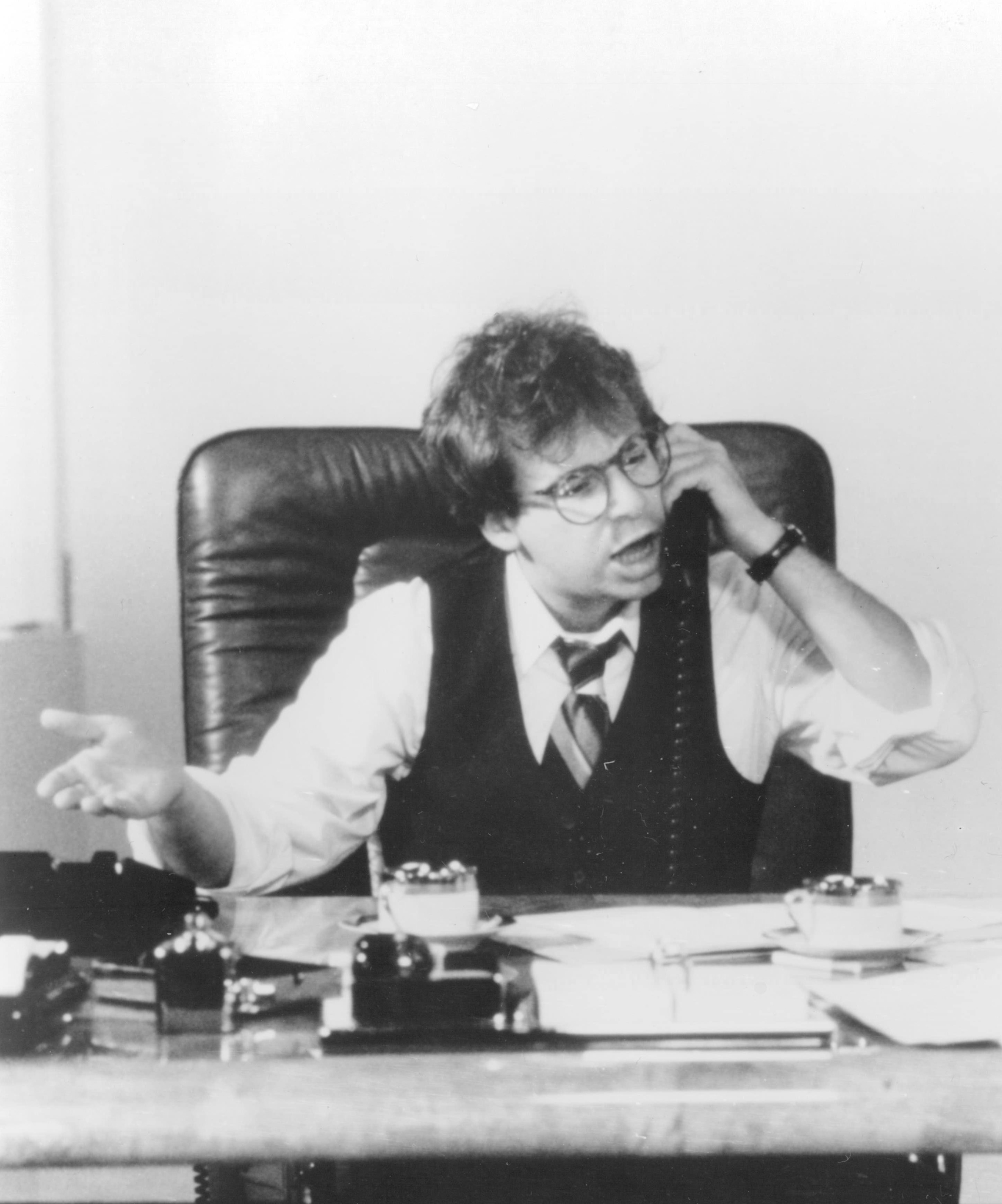 Still of Rick Moranis in Head Office (1985)