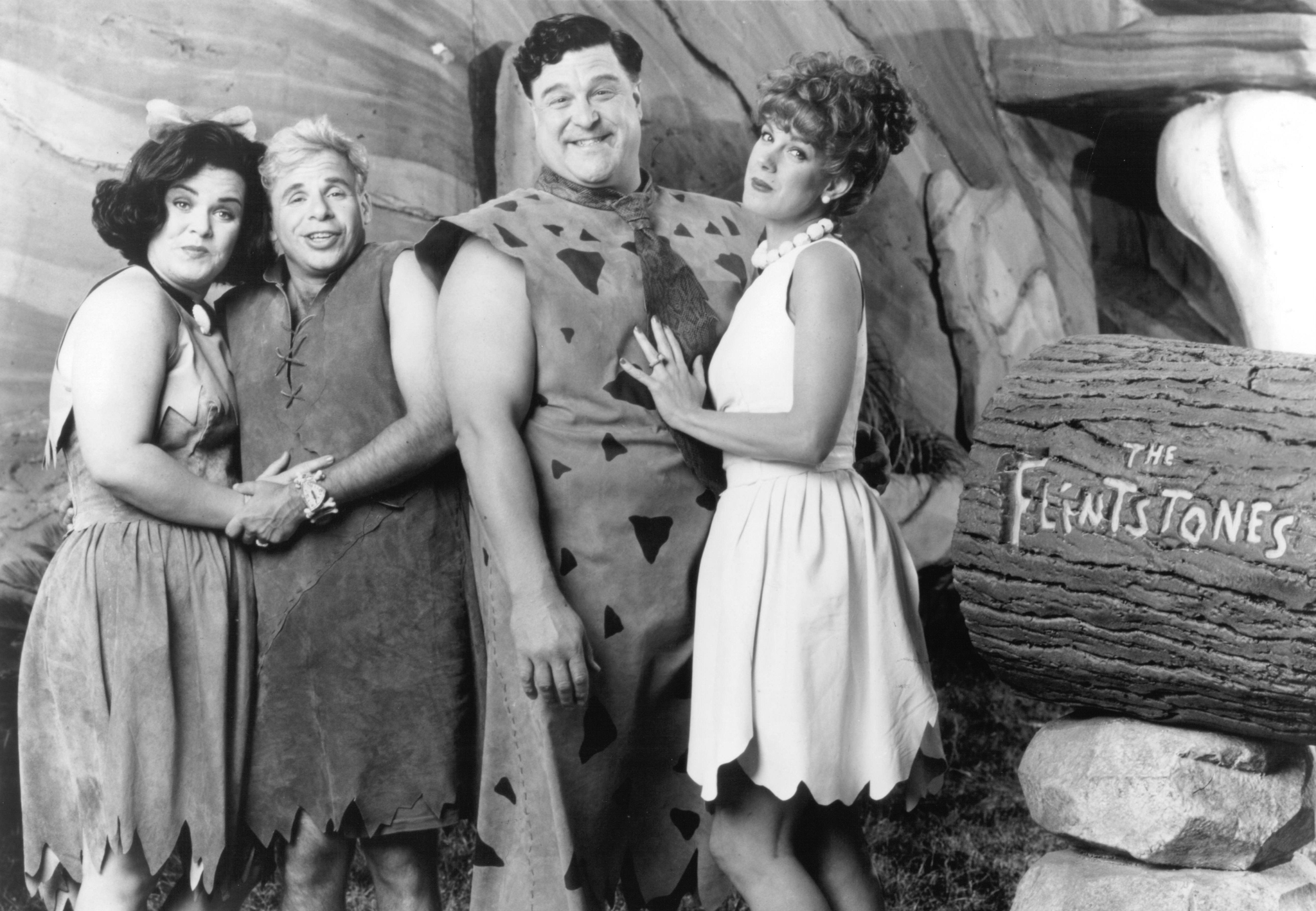 Still of John Goodman, Rick Moranis, Elizabeth Perkins and Rosie O'Donnell in The Flintstones (1994)