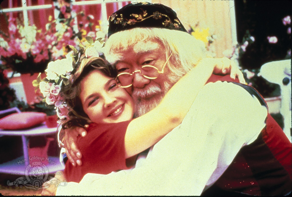 Still of Drew Barrymore and Pat Morita in Babes in Toyland (1986)