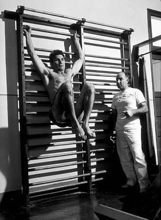 Jack Palance and Hollywood trainer, Terry Hunt, 1954.