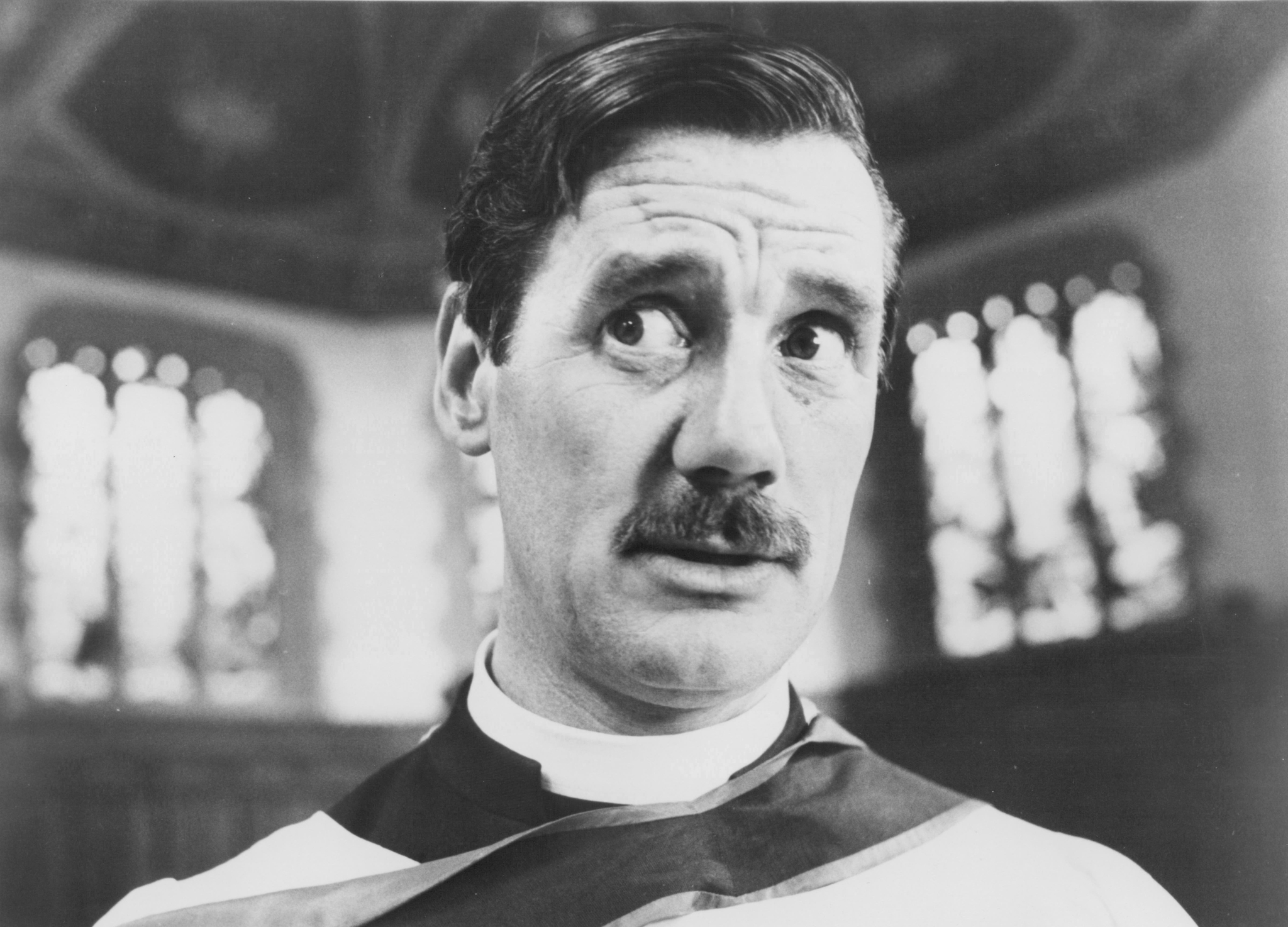 Still of Michael Palin in The Meaning of Life (1983)