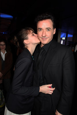 John Cusack and Amanda Peet at event of 2012 (2009)