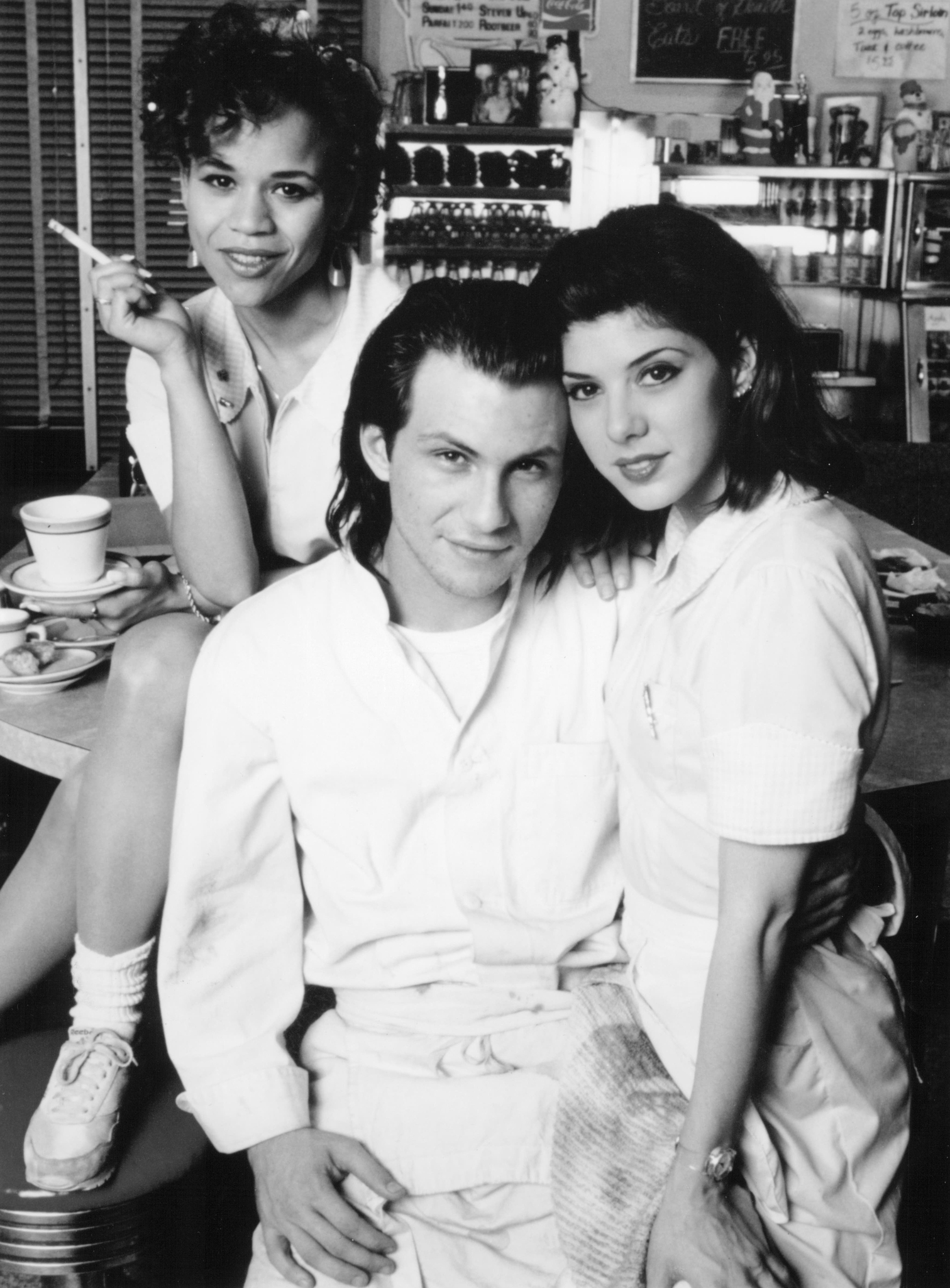Still of Christian Slater, Marisa Tomei and Rosie Perez in Untamed Heart (1993)