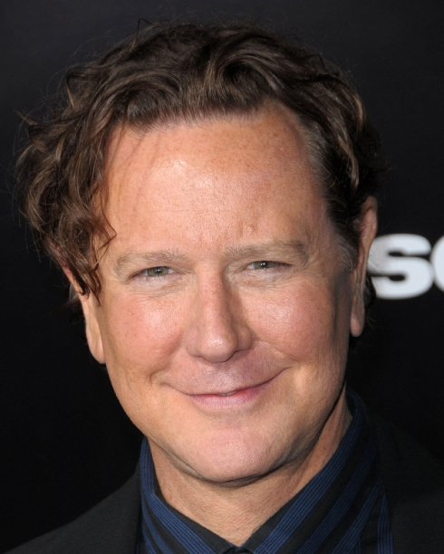 Judge Reinhold arrives at the premiere of The Runaways