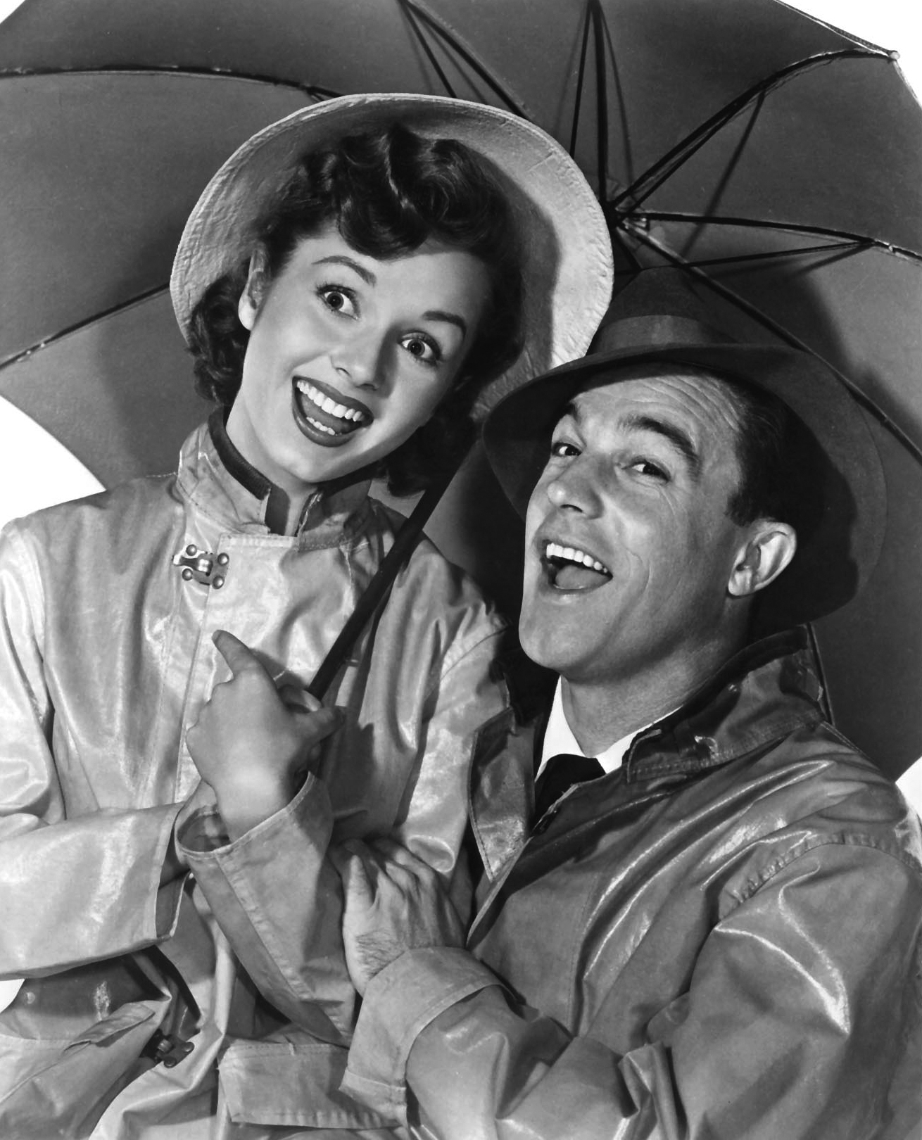 Still of Gene Kelly and Debbie Reynolds in Singin' in the Rain (1952)