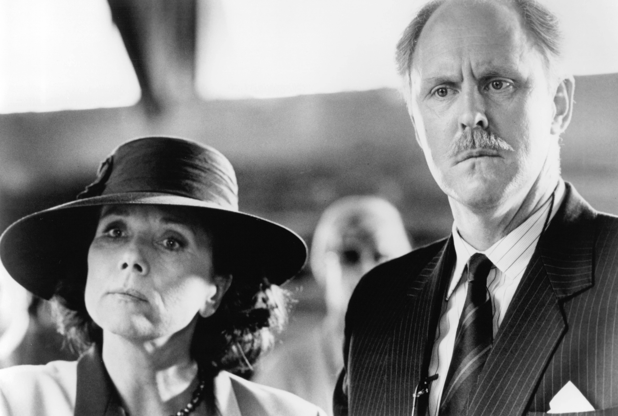 Still of John Lithgow and Diana Rigg in A Good Man in Africa (1994)