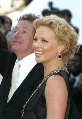 Charlize Theron and Geoffrey Rush at event of The Life and Death of Peter Sellers (2004)