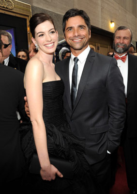 John Stamos and Anne Hathaway