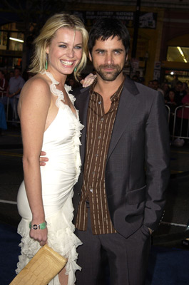 John Stamos and Rebecca Romijn at event of Iksmenai 2 (2003)