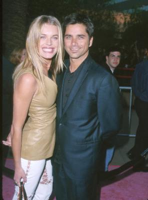 John Stamos and Rebecca Romijn at event of Austin Powers: The Spy Who Shagged Me (1999)