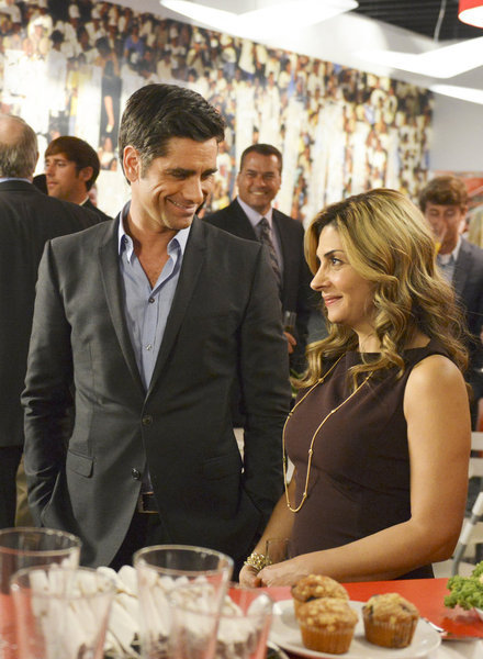Still of John Stamos and Callie Thorne in Necessary Roughness (2011)