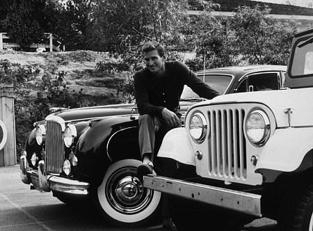 Rod Taylor with his Jaguar Sedan and Jeep