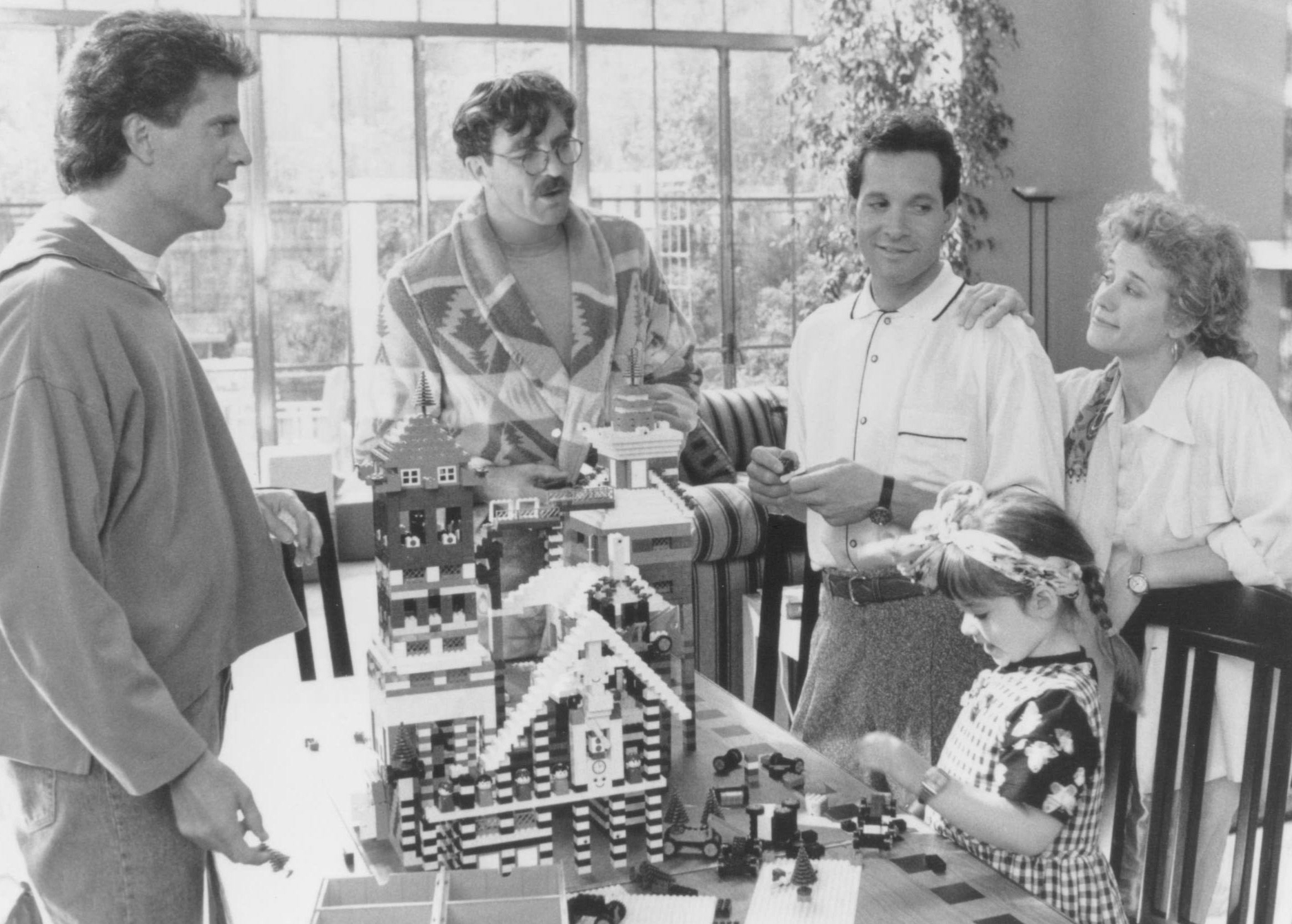 Still of Steve Guttenberg, Tom Selleck, Ted Danson, Nancy Travis and Robin Weisman in 3 Men and a Little Lady (1990)