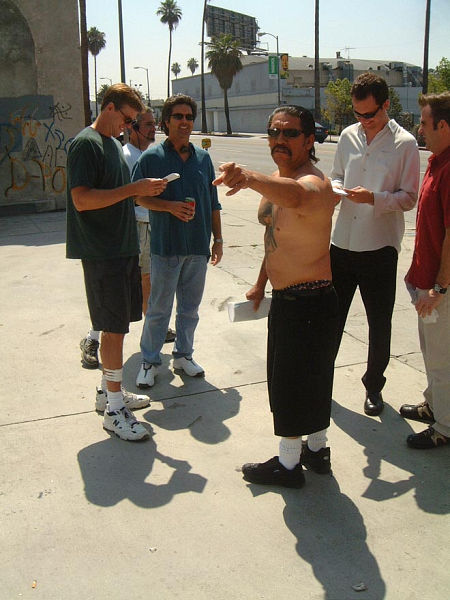 Left to right, Directors Rob Muir and Bob Hilgenberg rehearse actors, Danny Trejo, Johnny Sneed and Christopher Moynihan on the set of 