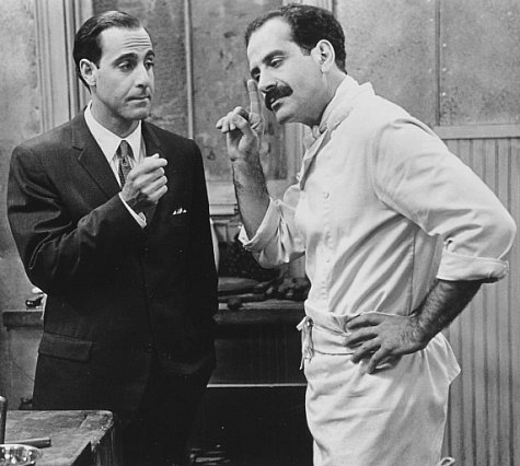 Still of Tony Shalhoub and Stanley Tucci in Big Night (1996)