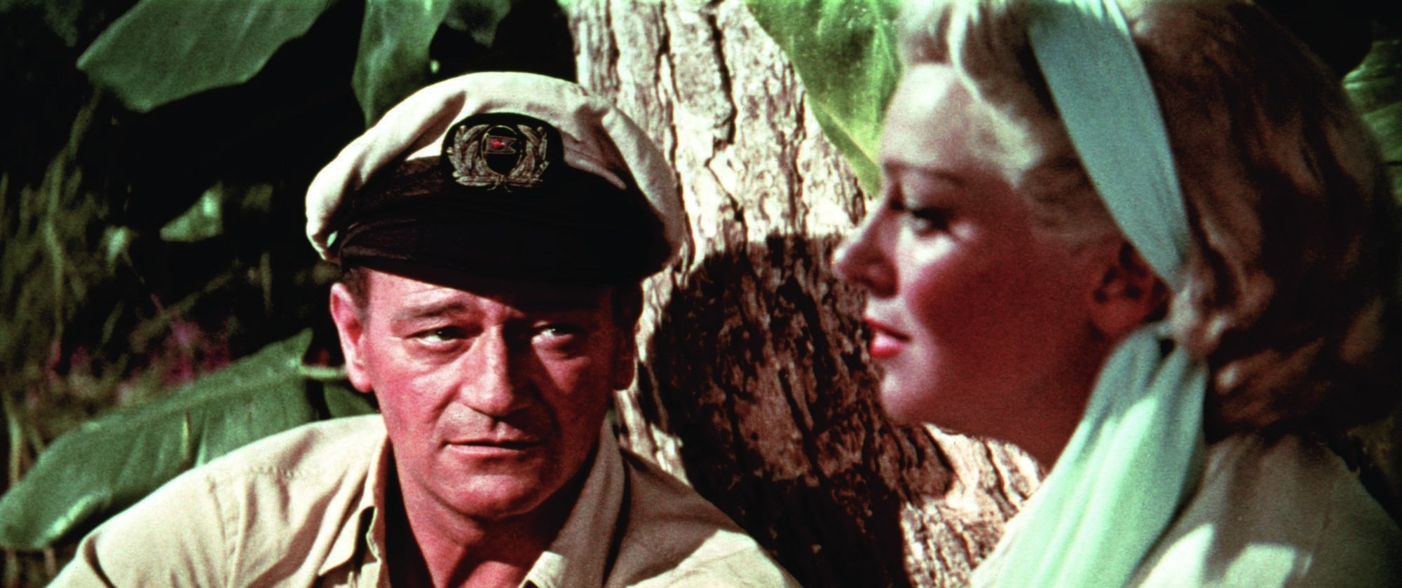 Still of John Wayne and Lana Turner in The Sea Chase (1955)