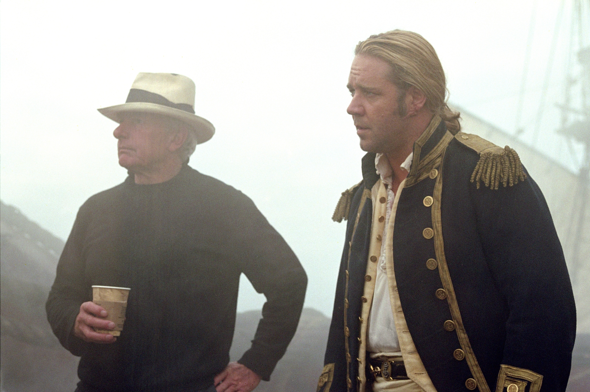 Still of Russell Crowe and Peter Weir in Master and Commander: The Far Side of the World (2003)
