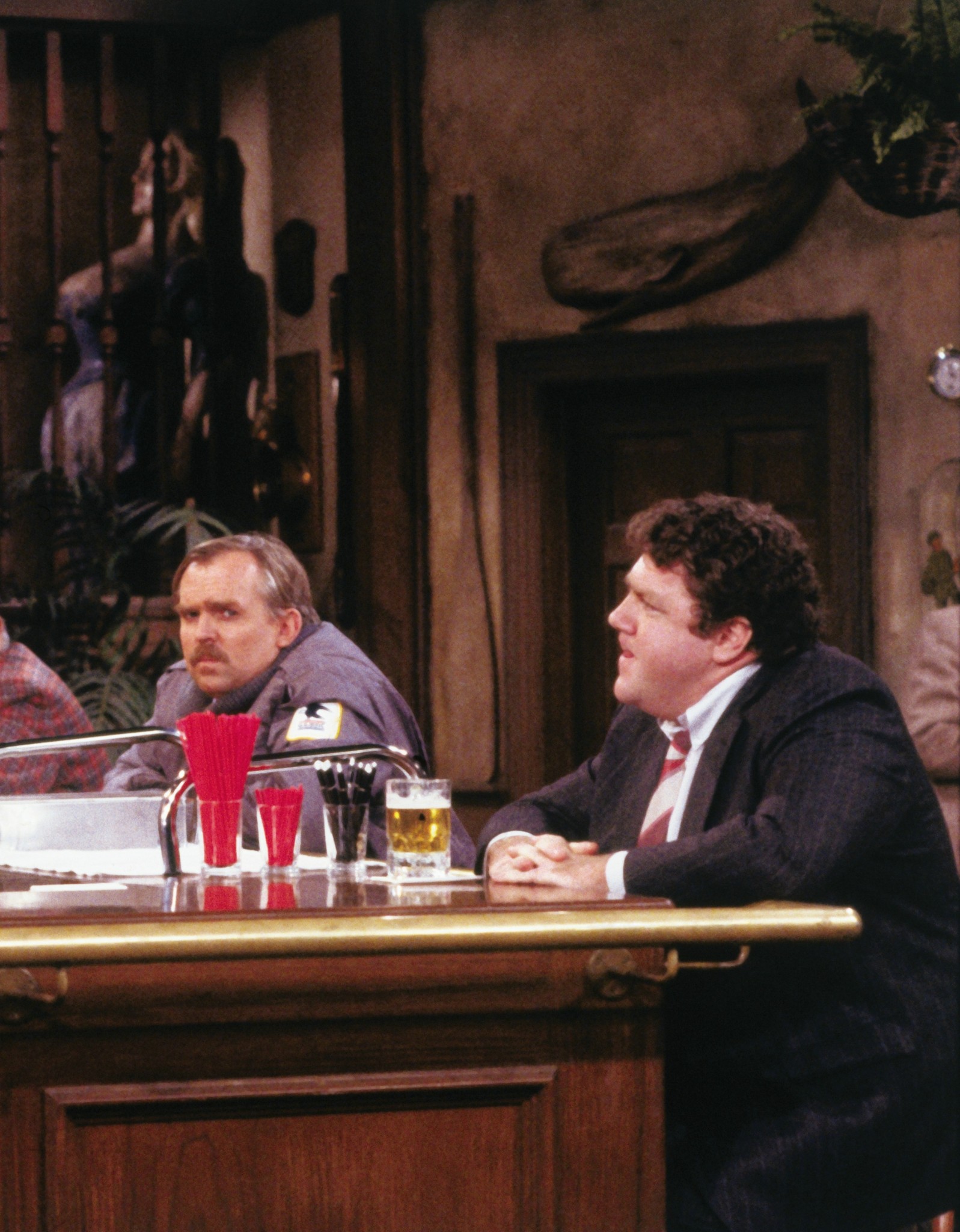 Still of John Ratzenberger and George Wendt in Cheers (1982)