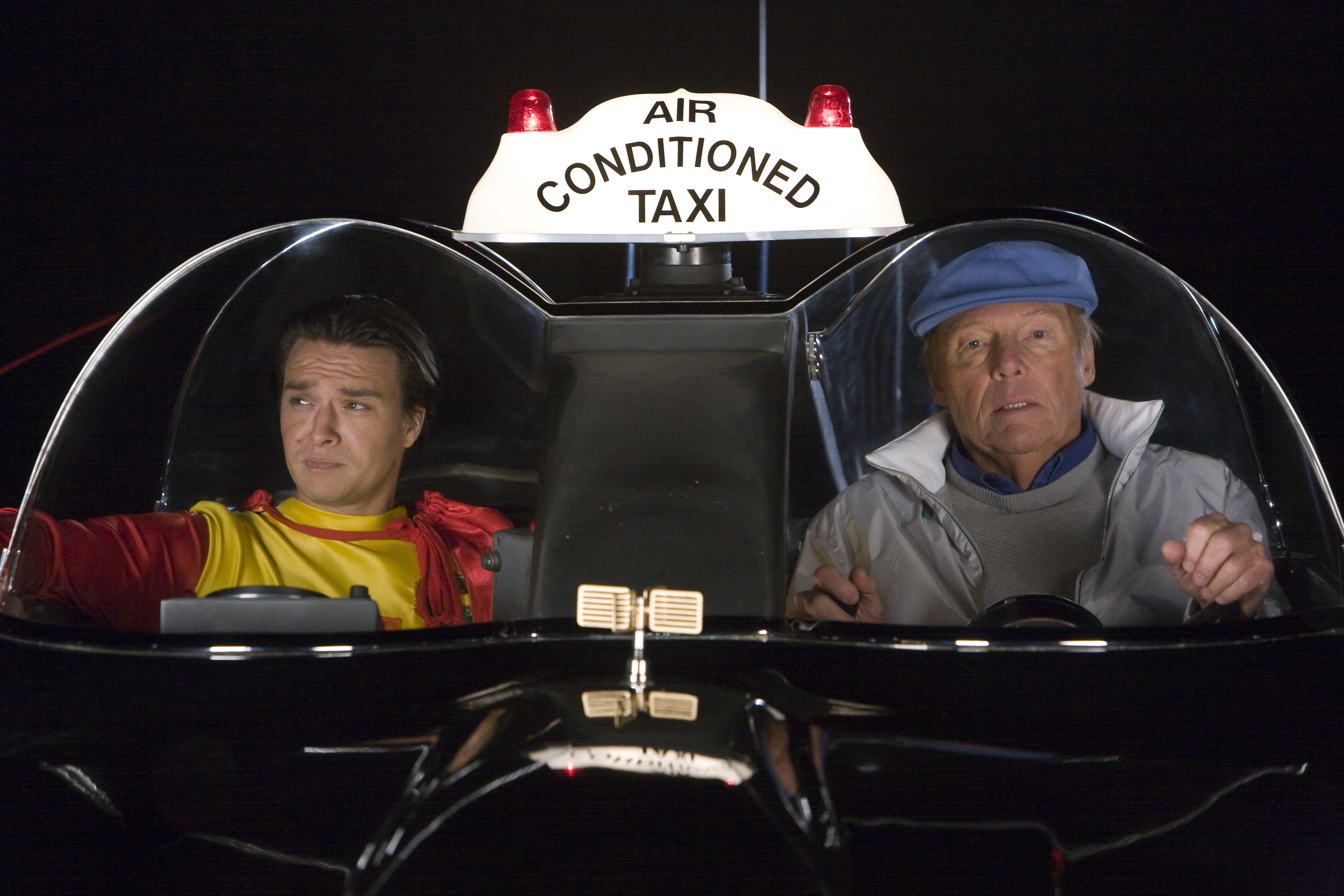 Adam West and Justin Whalin in Super Capers: The Origins of Ed and the Missing Bullion (2009)