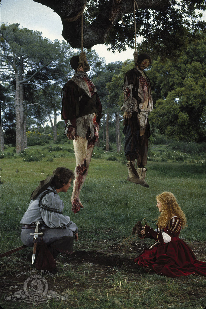 Still of Jennifer Jason Leigh and Tom Burlinson in Flesh+Blood (1985)