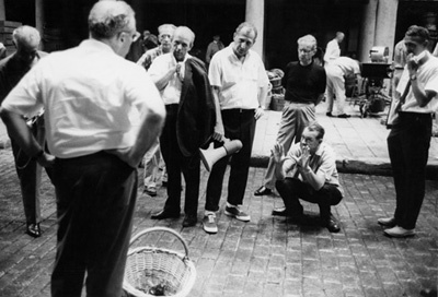 Director George Cukor, art director Gene Allen, assistant director David Hall, cinematographer Harry Stradling Sr. and assistant to Allen, Ed Grave, during the making of 