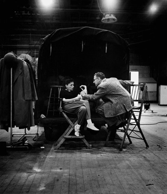 Director George Cukor with Judy Garland on the set of 