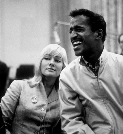 Sammy Davis, Jr. and May Britt at a recording session, 1960.