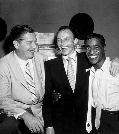 Sammy Davis, Jr. with Frank Sinatra and Milton Berle, circa 1958.