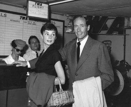 Audrey Hepburn and Mel Ferrer arriving in Rome