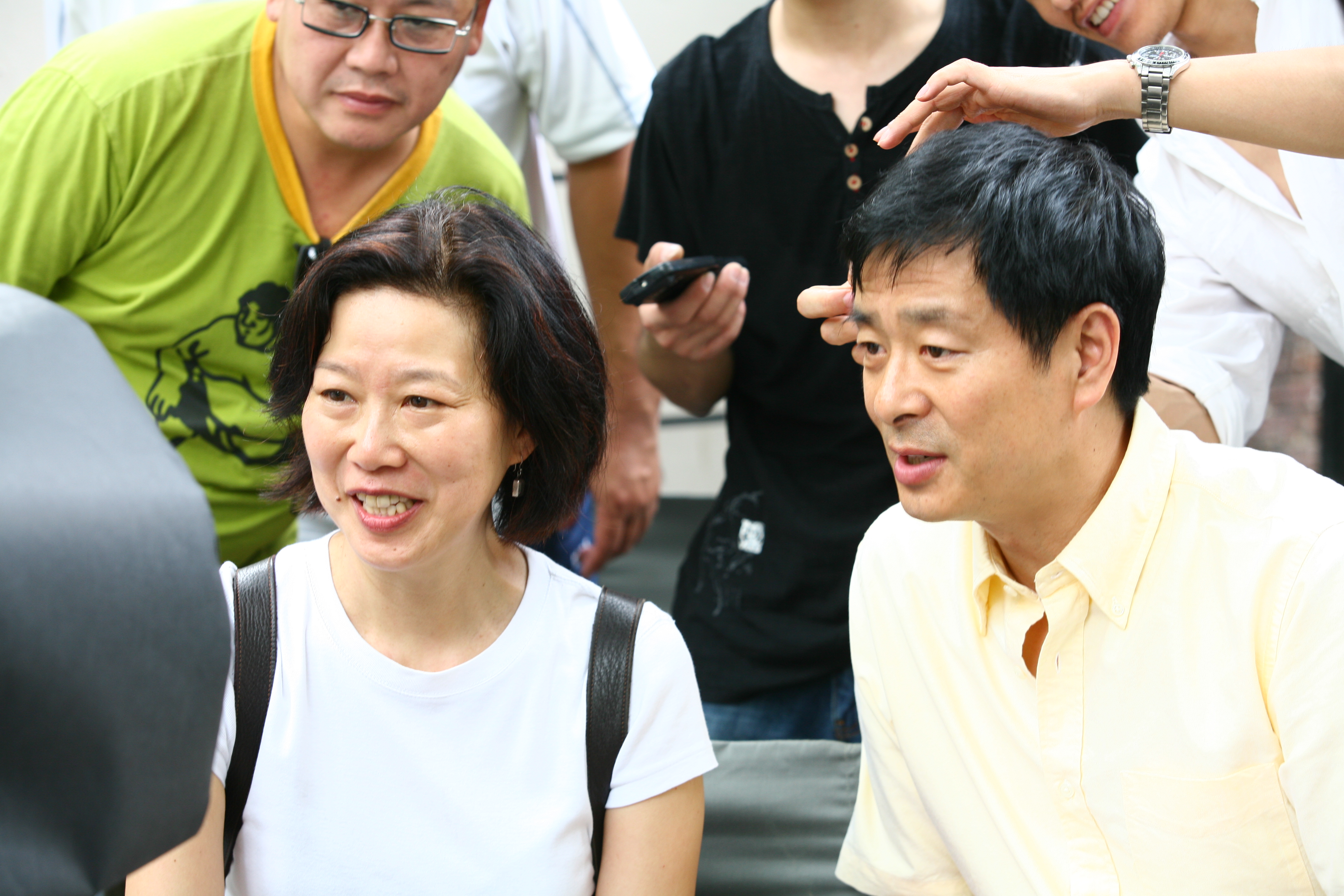 Ruby Yang on location in Shanghai with actor (AIDS ambassador) Pu Cunxin.