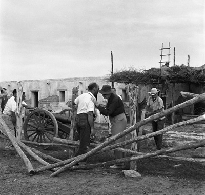 Photographer Bernie Abramson speaking to John Ford on location during the filming of 