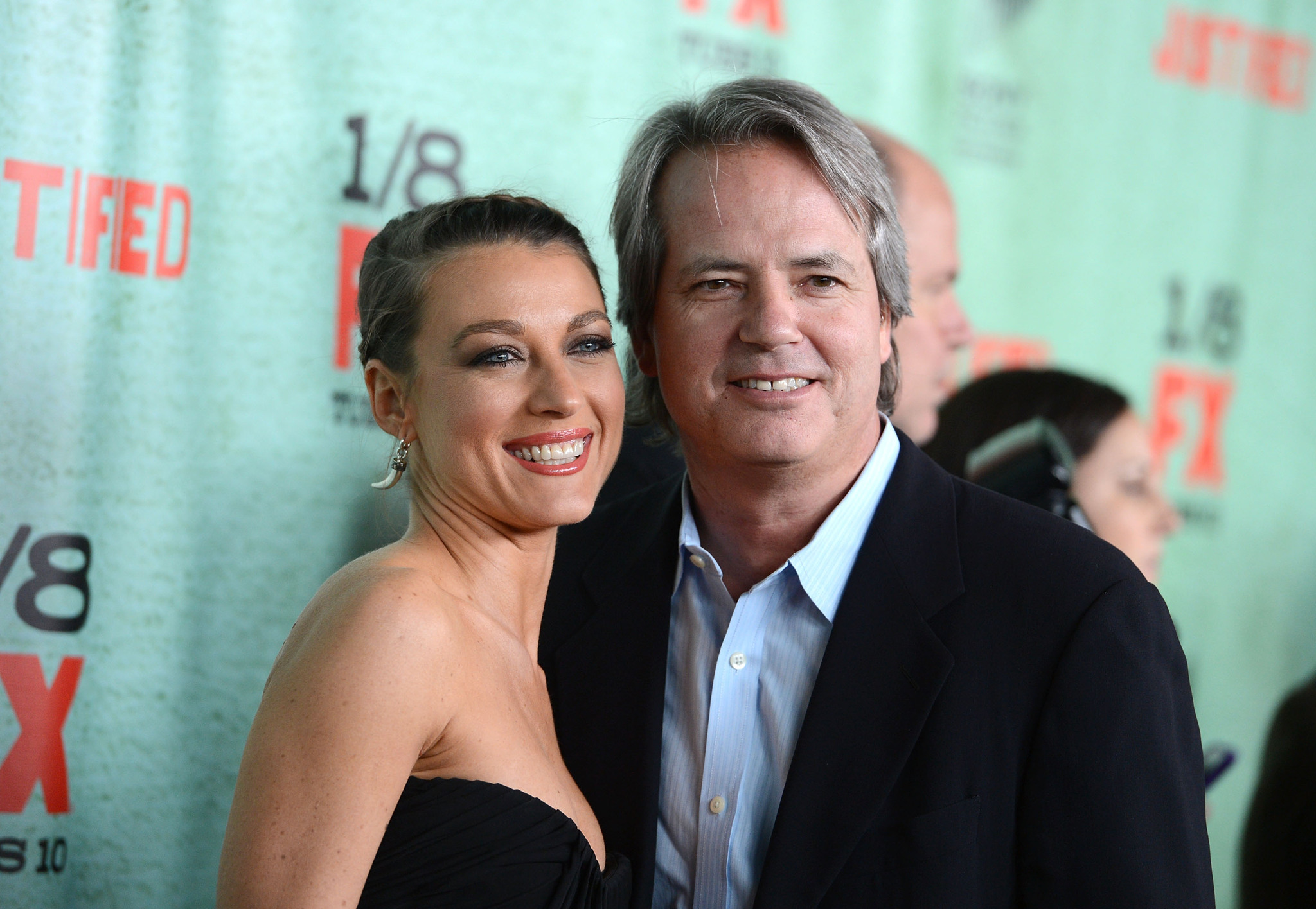 Natalie Zea and Graham Yost attend the Premiere Of FX's 