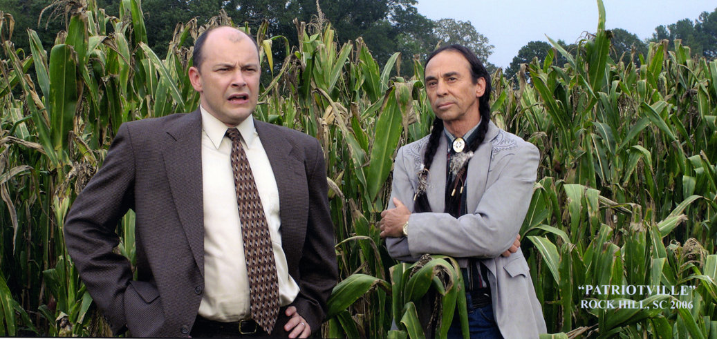 Rob Corddry (left) as Mayor Fishback and David Jensen as Chief Samuel Many Bulls in 