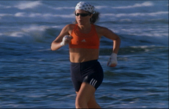 Jones (J.A. Steel) goes for an early morning run on the beach.